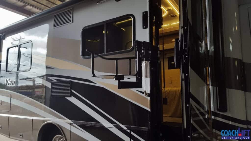 Interior-mount lift in the step well of a Class C motorhome