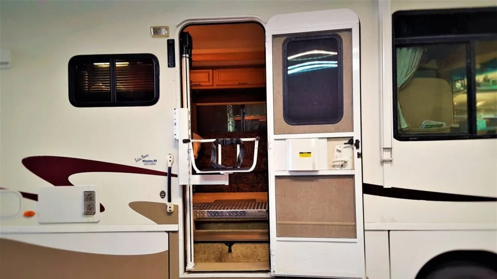 Exterior-mount lift beside the door of a 2007 Winnebago Sightseer